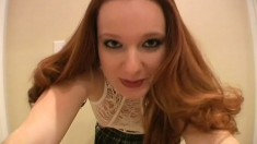 Delicious red-haired courtesan bares her chubby tattooed ass