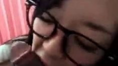 Japanese Cutie With Glasses Sucks A Cock