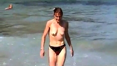 Girl Topless On Beach With Small Empty Saggy Tits