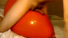 Big inflatable orange balloon humping cum