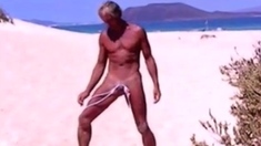 Tanned Guy On Beach In Tiny String Thong (temporarily!)